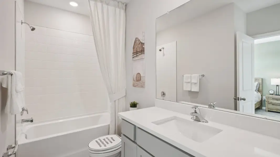 Furnished interior view inside a new home in Towns at Woodsdale, Wesley Chapel (Image 27).