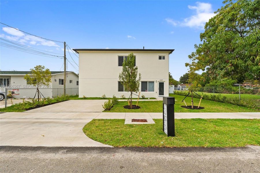 Front exterior of a new home in , Miami, FL, highlighting curb appeal (Image 2). Front exterior of a new home in , Miami, FL, highlighting curb appeal (Image 2).