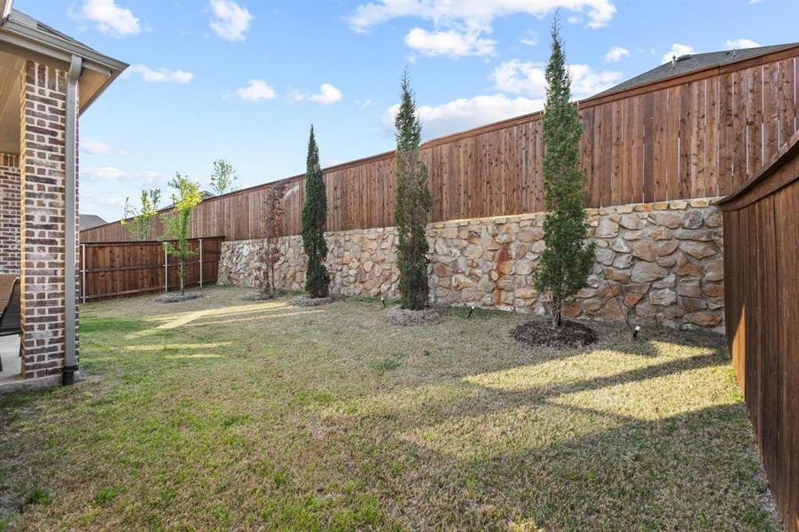 Exterior details and patio area of a home in Gateway Village - The Reserve, Denison (Image 23).