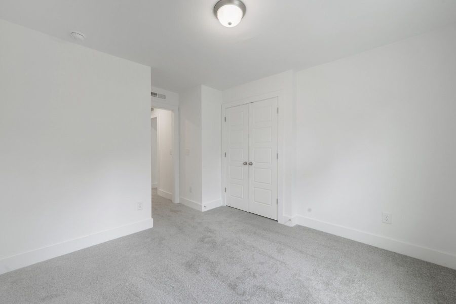 Representative unfurnished interior of a home built from the Aurora by Mattamy Homes in Ashmore Townes, Garner (Image 18).