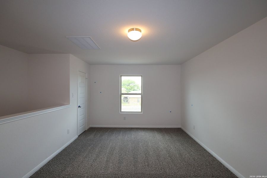 Spacious, unfurnished interior of a new home in Verano Farms, Von Ormy (Image 31).