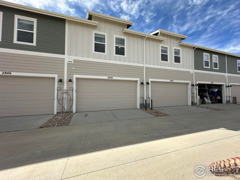 back of home - ATTACHED TWO CAR GARAGE!