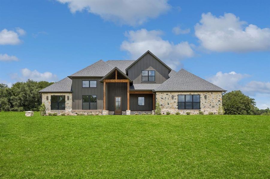 Front exterior of a new home in RangeWood, Weatherford, TX, highlighting curb appeal (Image 1). Front exterior of a new home in RangeWood, Weatherford, TX, highlighting curb appeal (Image 1).
