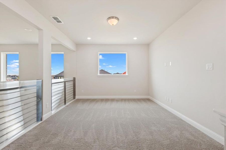 Spacious, unfurnished interior of a new home in Symmetry 37s, Frisco (Image 25).