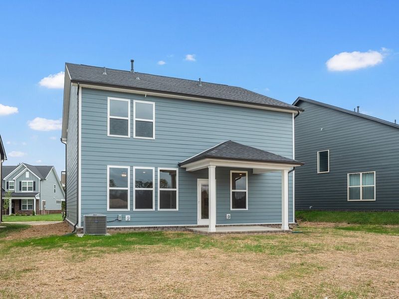 Exterior details and patio area of a home in Woods Crossing, Gallatin (Image 26).