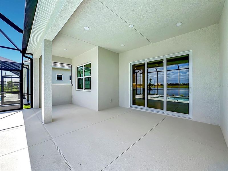Exterior details and patio area of a home in Watercolor Place, Bradenton (Image 29).