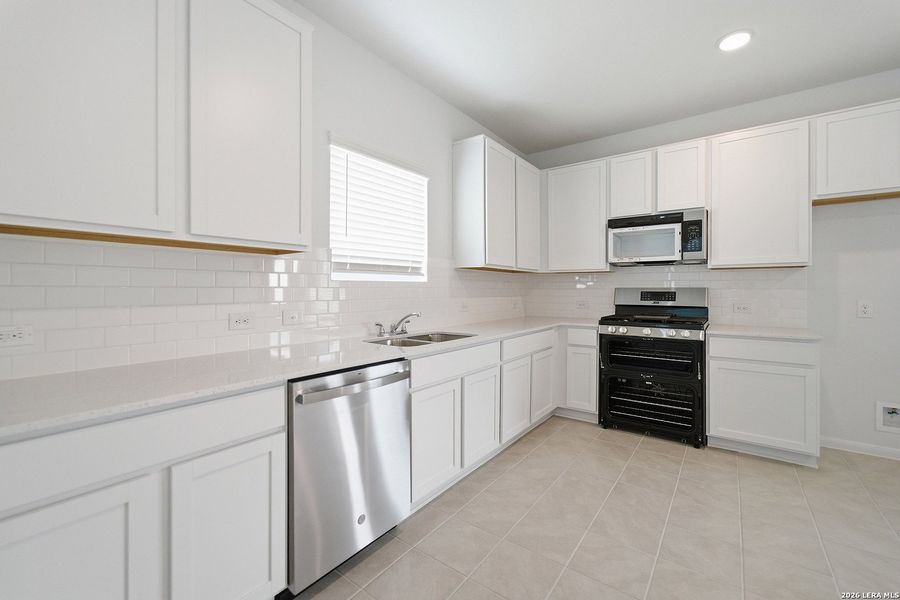 Furnished interior view inside a new home in Hennersby Hollow, San Antonio (Image 11).