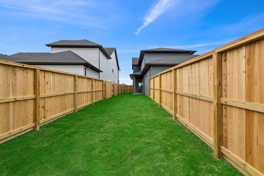 Exterior details and patio area of a home in Elyson 40', Katy (Image 3).
