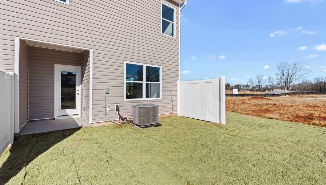 Exterior details and patio area of a home in Covington Village, Greer (Image 2).