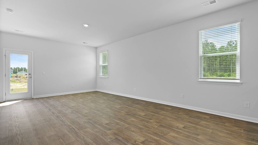 Spacious, unfurnished interior of a new home in Pine Hills at Cane Bay, Summerville (Image 6). Spacious, unfurnished interior of a new home in Pine Hills at Cane Bay, Summerville (Image 6).