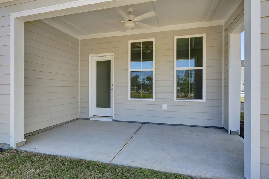 Front exterior of a new home in Grand Park, Leland, NC, highlighting curb appeal (Image 2).