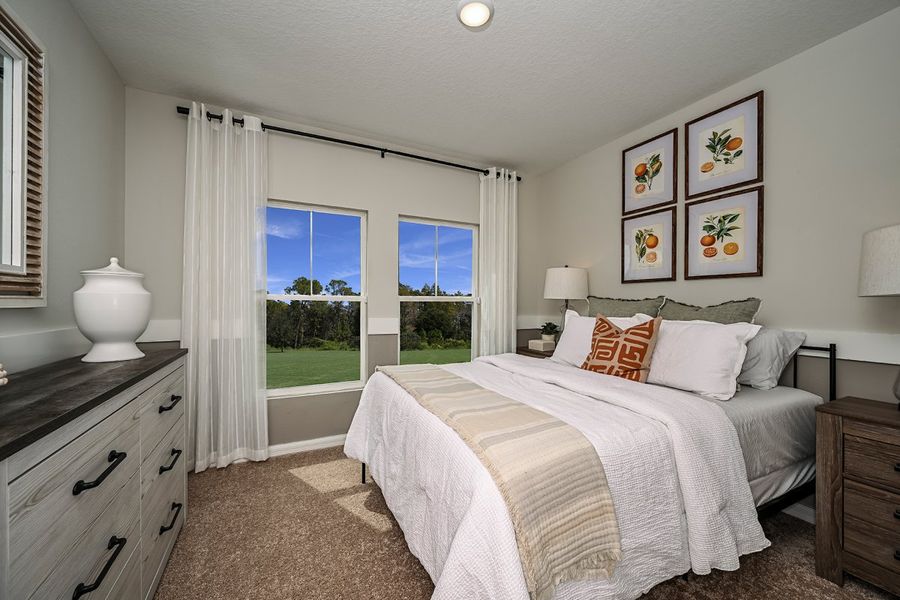Furnished interior view inside a new home in Scenic Terrace, Haines City (Image 12).
