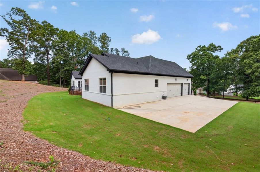 Exterior details and patio area of a home in , Hoschton (Image 27).