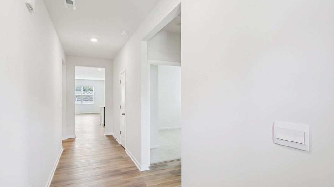 Representative unfurnished interior of a home built from the Cali by D.R. Horton in Granite Falls, Lancaster (Image 15).