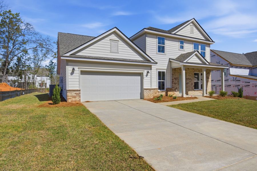 Front exterior of a new home in Carriage Estates, Lexington, SC, highlighting curb appeal (Image 27).