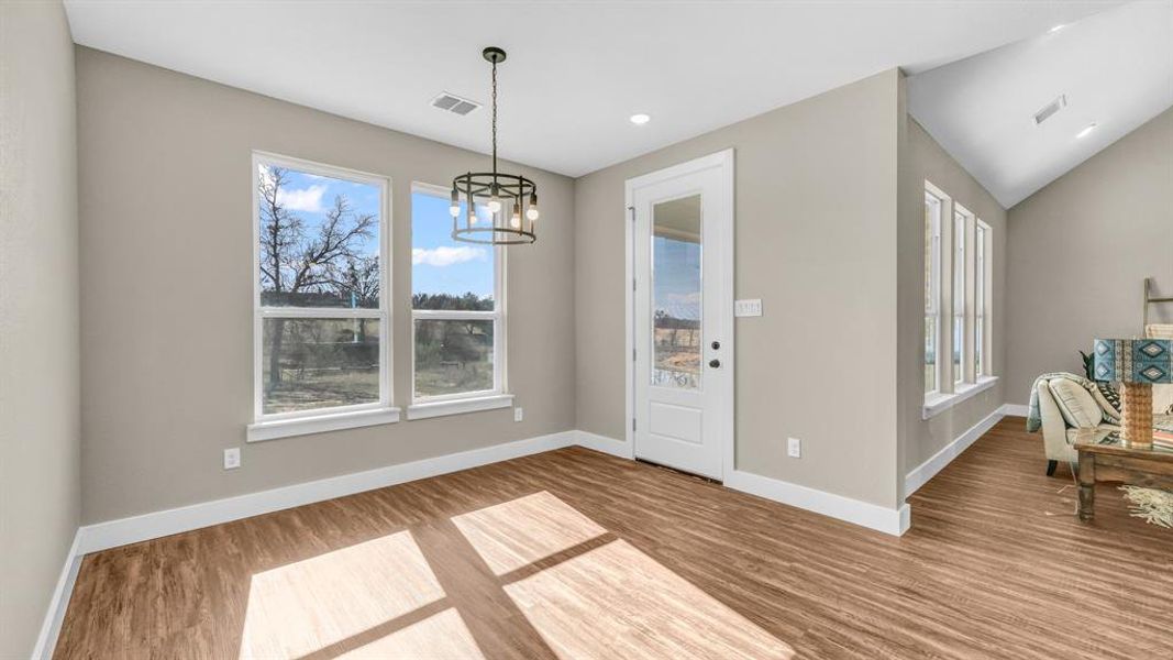 Semi-private dining room just off the open concept kitchen.