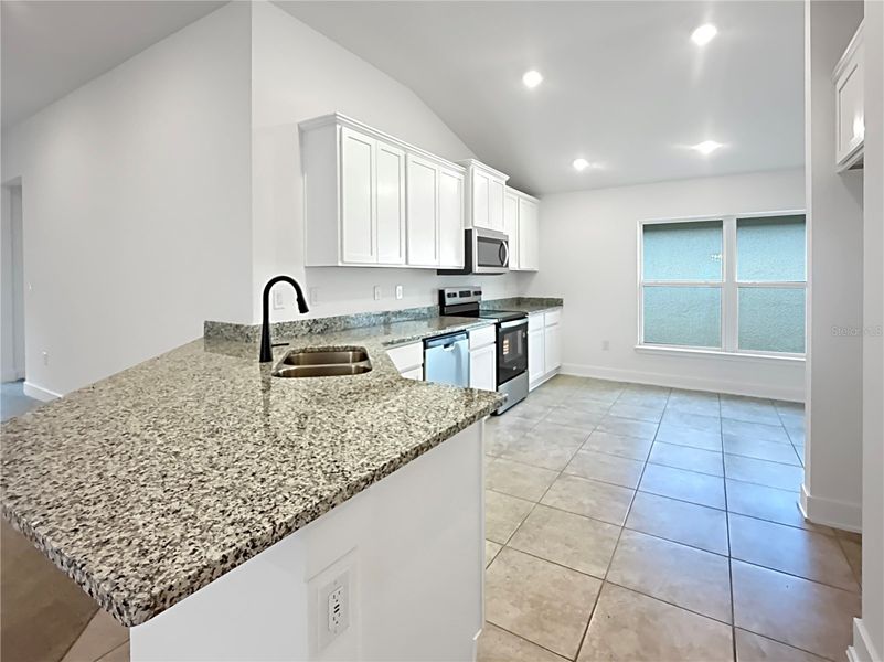 Furnished interior view inside a new home in Harmony Central, St. Cloud (Image 5).