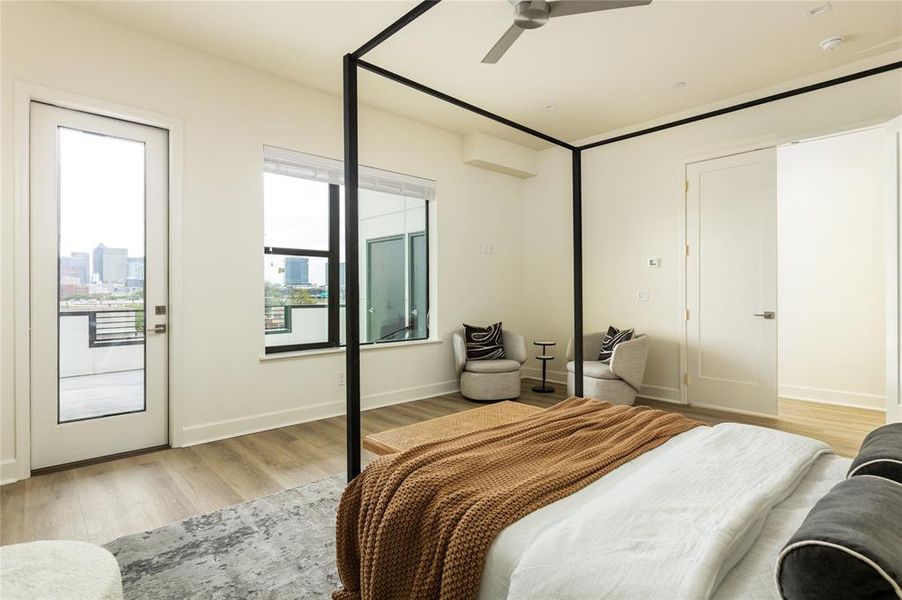 Bedroom with light wood-type flooring and ceiling fan