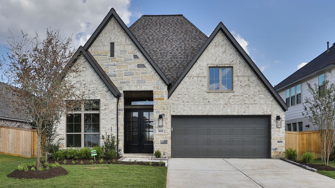 Front exterior of a new home in Everly, Hockley, TX, highlighting curb appeal (Image 1). Front exterior of a new home in Everly, Hockley, TX, highlighting curb appeal (Image 1).