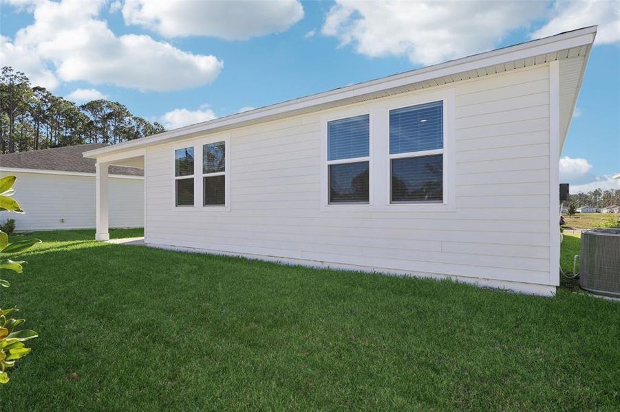 Exterior details and patio area of a home in , Palm Coast (Image 4).