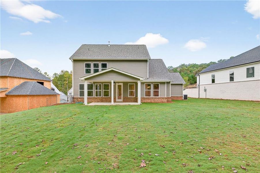 Exterior details and patio area of a home in The Manor at Gainesville Township, Gainesville (Image 27).