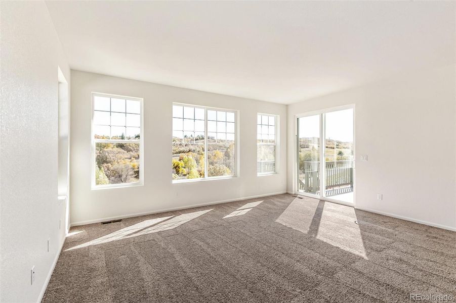 Spacious, unfurnished interior of a new home in Terrain Oak Valley, Castle Rock (Image 20).