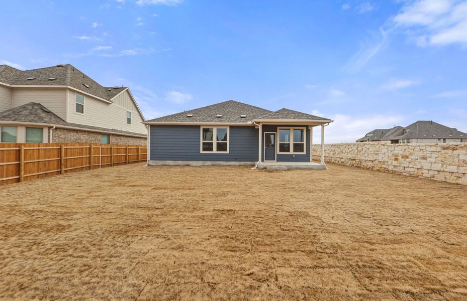 Exterior details and patio area of a home in Saddleback at Santa Rita Ranch, Liberty Hill (Image 24). Exterior details and patio area of a home in Saddleback at Santa Rita Ranch, Liberty Hill (Image 24).