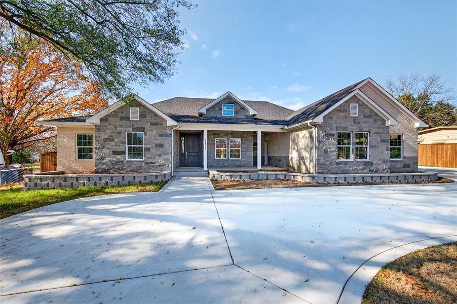 Front exterior of a new home in , Denison, TX, highlighting curb appeal (Image 24).