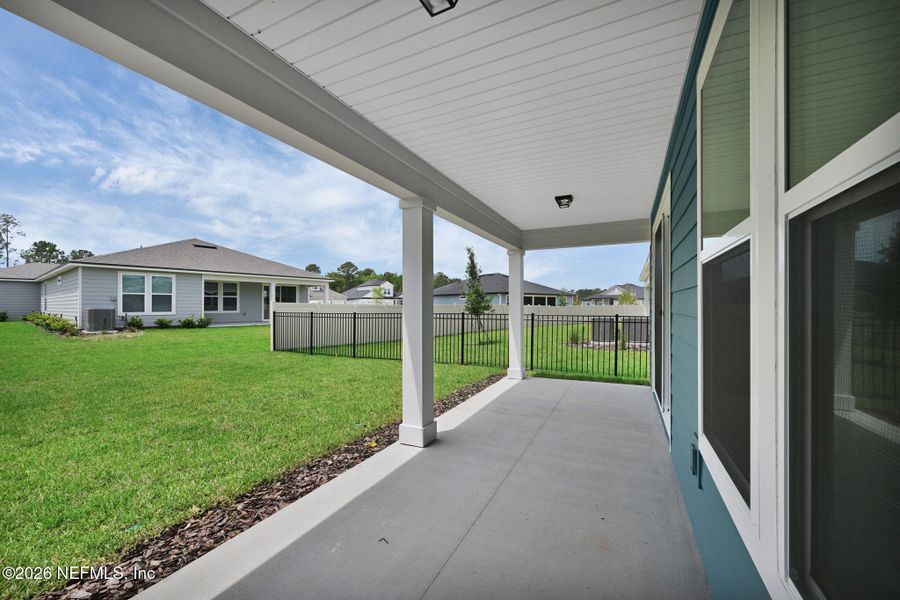 Exterior details and patio area of a home in Hyland Trail, Green Cove Springs (Image 31).
