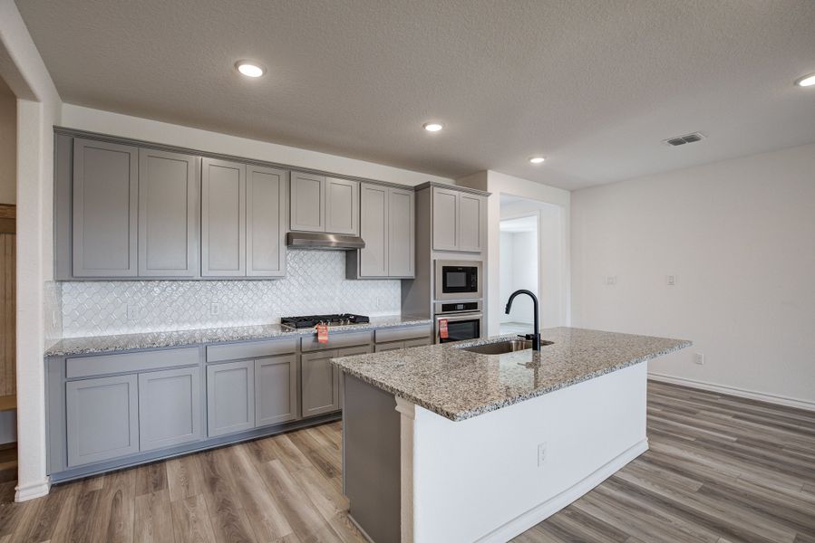 Representative furnished interior of a home built from the The Lanier F by Davidson Homes LLC in The Reserve at Potranco Oaks, Castroville (Image 7).