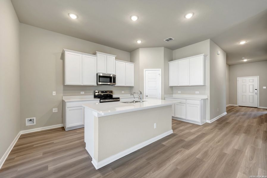 Furnished interior view inside a new home in Greenspoint Heights, Seguin (Image 9).