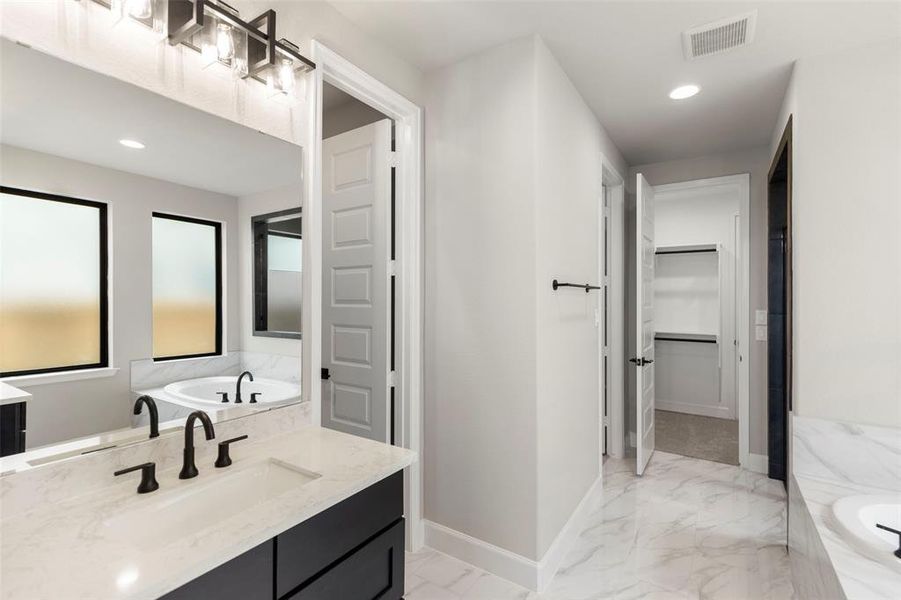 Fabulous Luxurious Primary Bathroom with Tons of Lighting