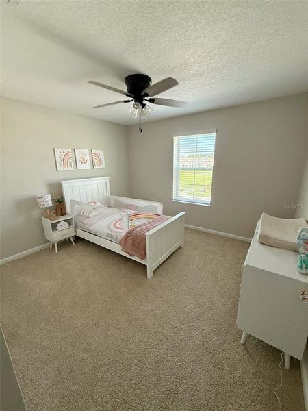 Furnished interior view inside a new home in The Trails, Palm Coast (Image 4).