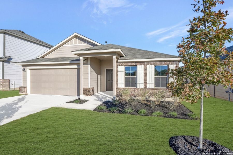 Front exterior of a new home in Winding Brook, San Antonio, TX, highlighting curb appeal (Image 25).