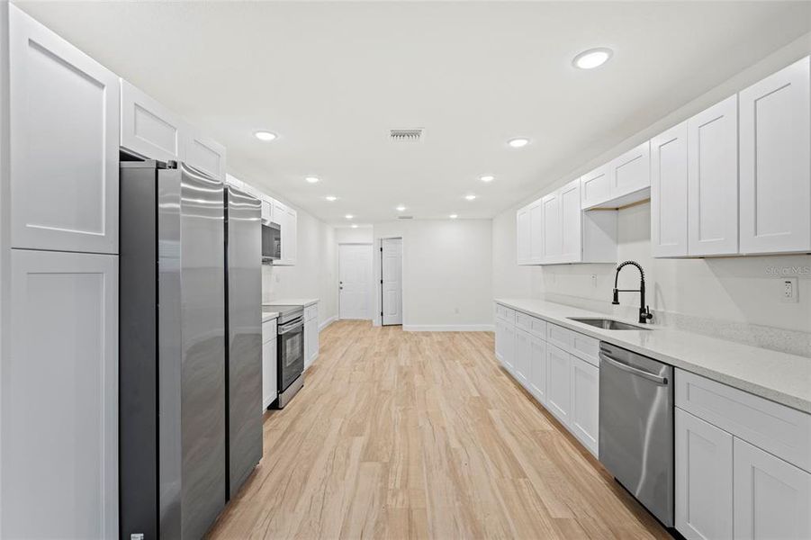 Furnished interior view inside a new home in , Okeechobee (Image 7).