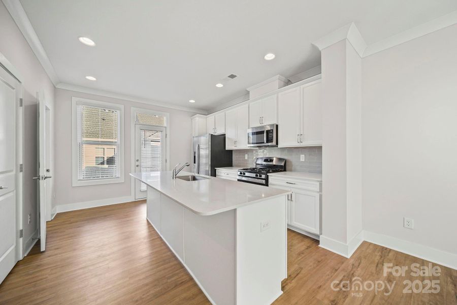 Furnished interior view inside a new home in , Huntersville (Image 10).