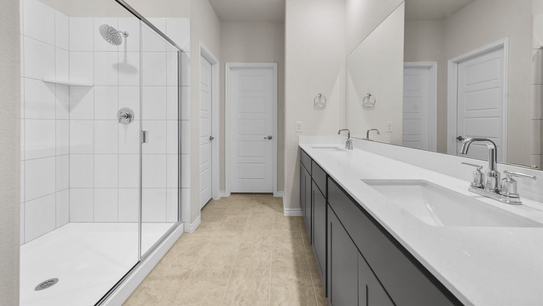 Representative furnished interior of a home built from the Bastrop by D.R. Horton in Woodcreek, Fate (Image 3).