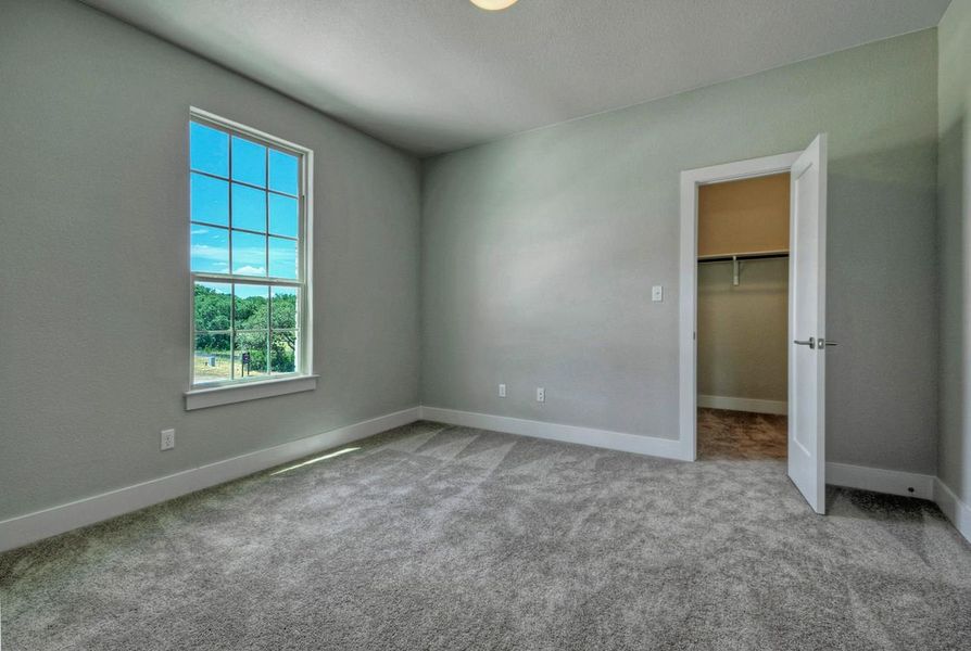 Representative unfurnished interior of a home built from the Madera II by Giddens Homes in Scofield Farms Estates, Georgetown (Image 22).