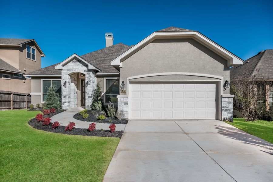 Representative exterior photo of a completed home built from the The Scottsdale IV by Whitestone Custom Homes in Johnson Ranch, Bulverde, TX (Image 1).