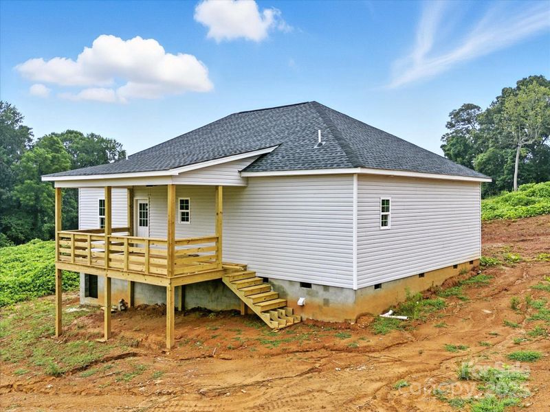 Front exterior of a new home in , Clover, SC, highlighting curb appeal (Image 20).