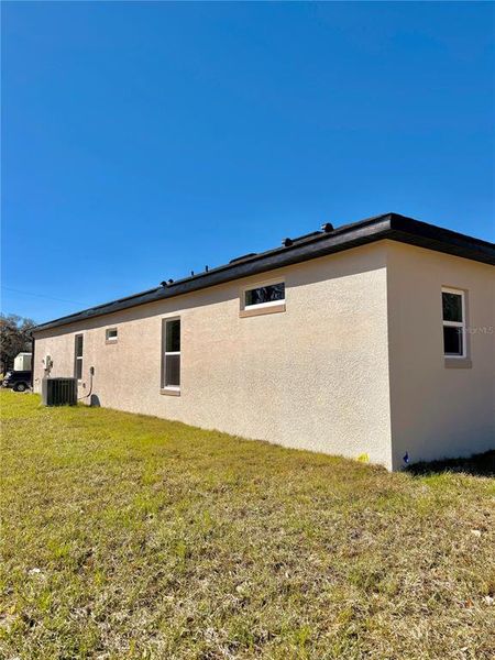 Exterior details and patio area of a home in , Center Hill (Image 2). Exterior details and patio area of a home in , Center Hill (Image 2).