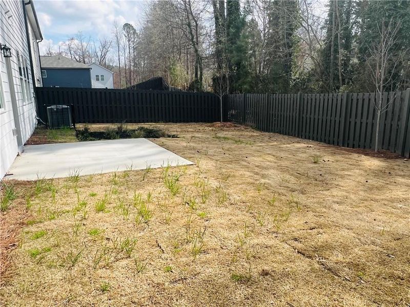 Exterior details and patio area of a home in Reserve at South River Gardens, Atlanta (Image 2). Exterior details and patio area of a home in Reserve at South River Gardens, Atlanta (Image 2).