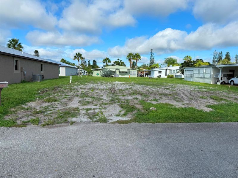 Front exterior of a new home in , Port St. Lucie, FL, highlighting curb appeal (Image 1).