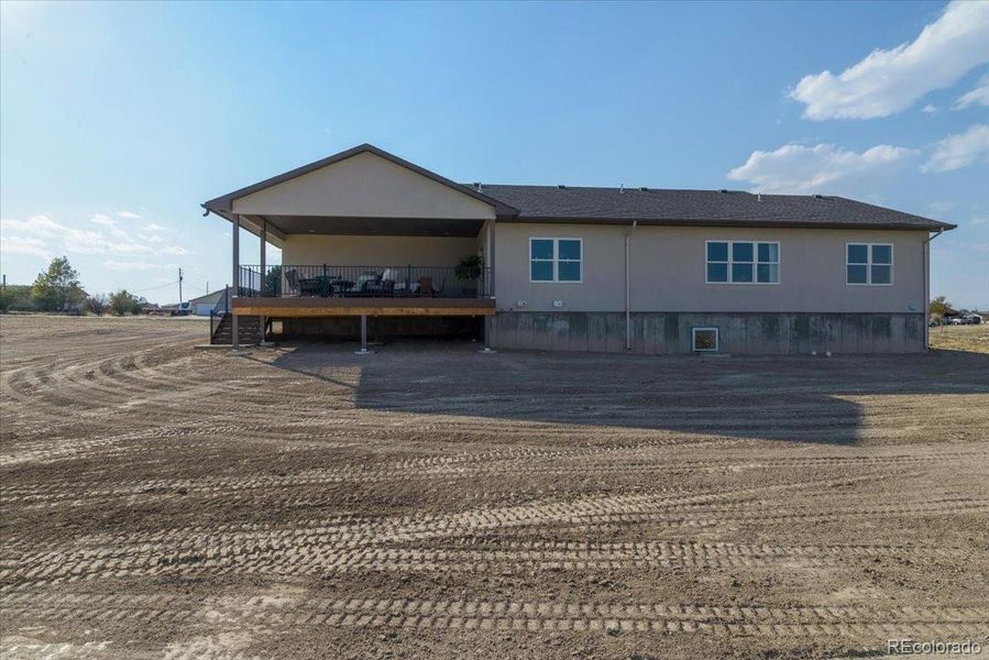 Front exterior of a new home in , Pueblo West, CO, highlighting curb appeal (Image 2).
