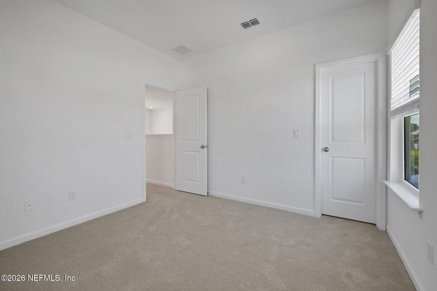 Spacious, unfurnished interior of a new home in Hyland Trail, Green Cove Springs (Image 39).