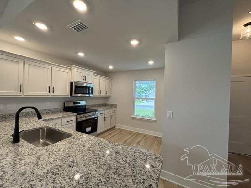 Furnished interior view inside a new home in Turtle Creek, Cantonment (Image 3).