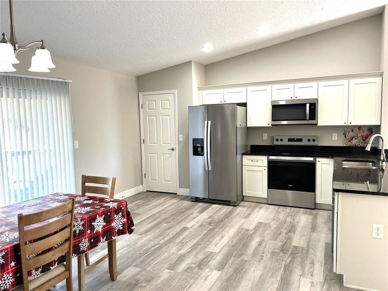 Furnished interior view inside a new home in , Dunnellon (Image 9).