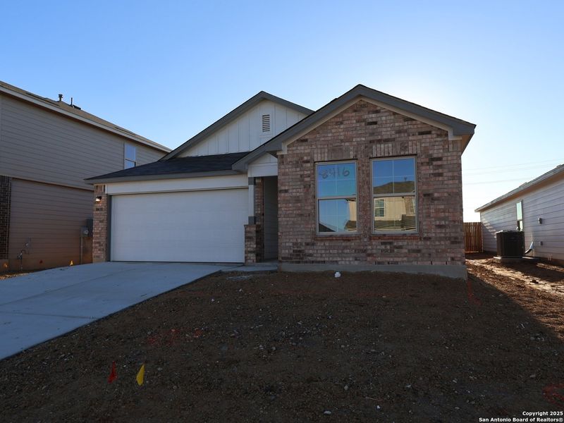 Front exterior of a new home in Agave, San Antonio, TX, highlighting curb appeal (Image 2).