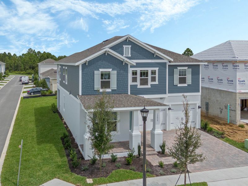 Representative exterior photo of a completed home built from the Faulkner by Rockwell Homes in Northlake at Ovation, Winter Garden, FL (Image 33). Representative exterior photo of a completed home built from the Faulkner by Rockwell Homes in Northlake at Ovation, Winter Garden, FL (Image 33).