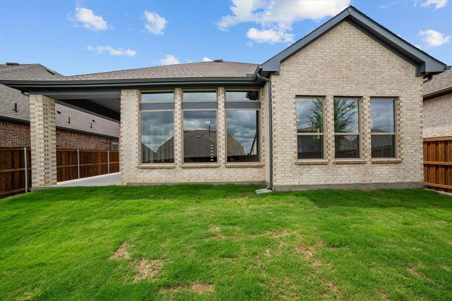 Front exterior of a new home in Highwoods, Fort Worth, TX, highlighting curb appeal (Image 2). Front exterior of a new home in Highwoods, Fort Worth, TX, highlighting curb appeal (Image 2).